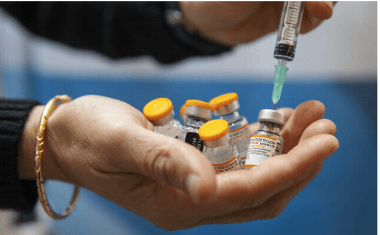 Pfizer's COVID-19 vaccine and drug sale to top $50 billion in 2022